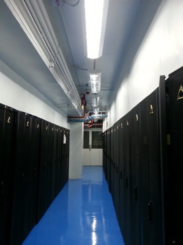 a long row of servers in a data center