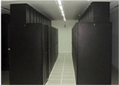 a long row of servers in a large room