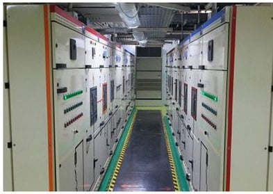 the inside of an electrical control room on a ship