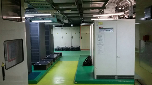 the inside of a large room with lots of electrical equipment