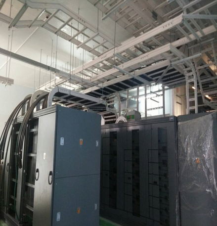 the inside of a large room with a lot of electrical equipment